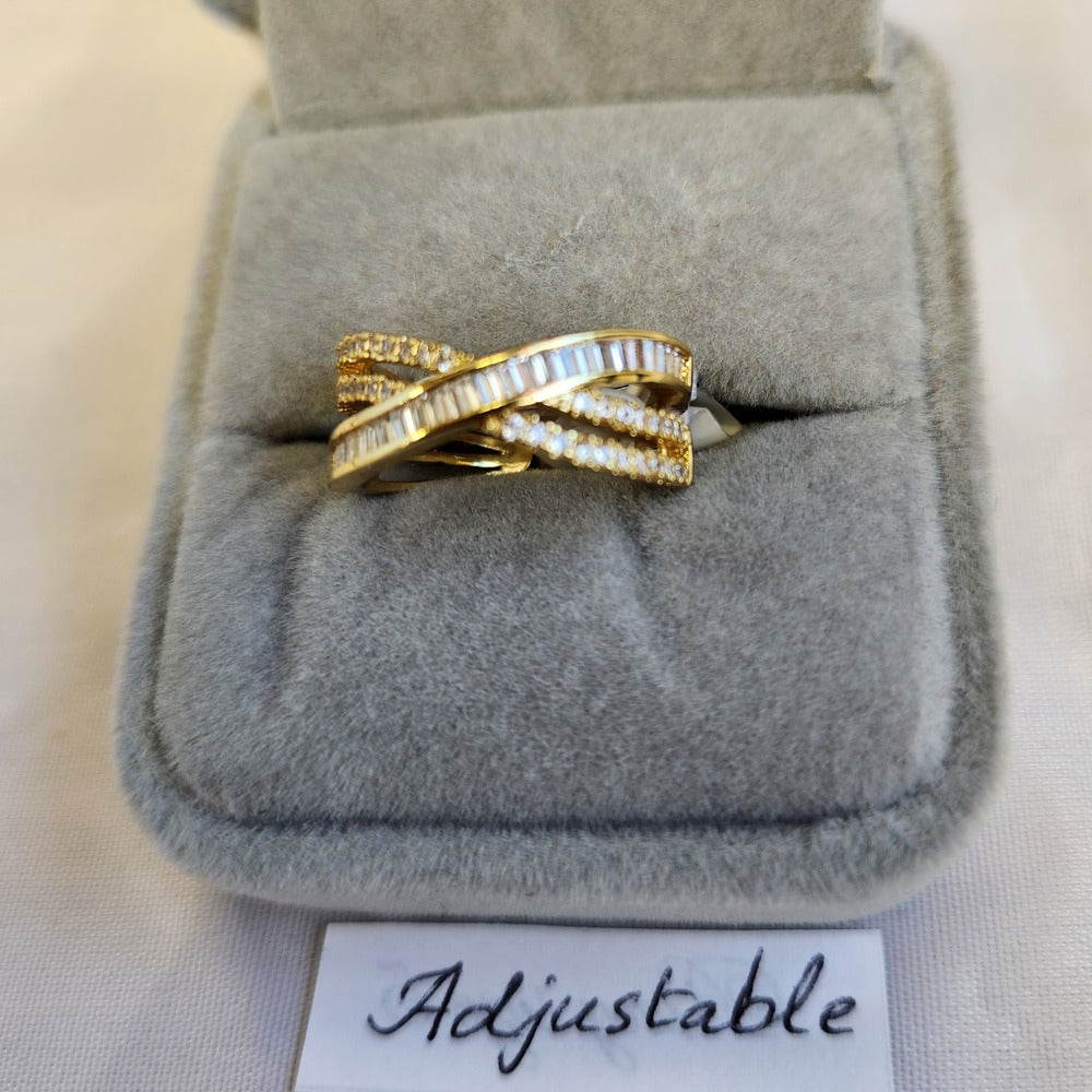 Detailed view of multi strand ring with round and baguette stones