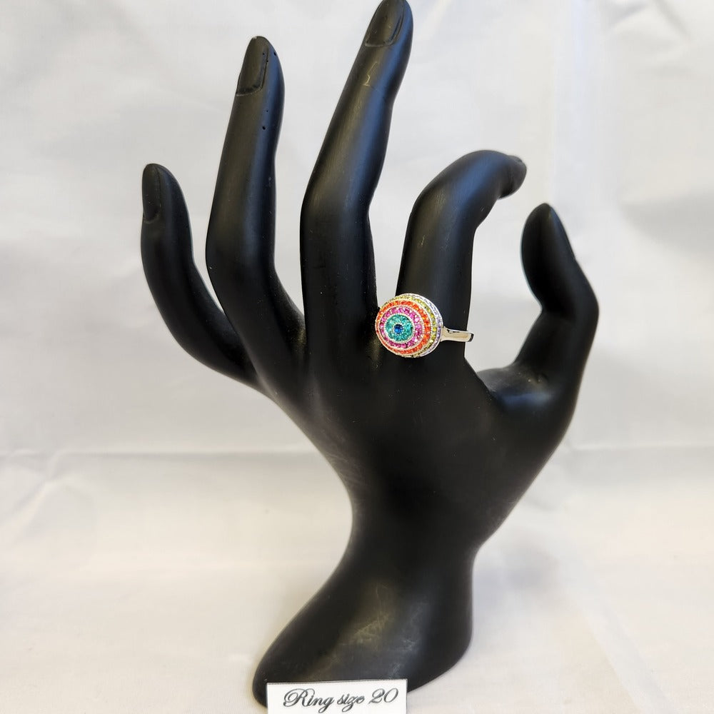 Dome design ring with rows of colorful stones displayed on a mannequin stand