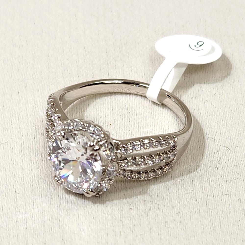 Another view of Exquisite silver ring with sparkling round center stone