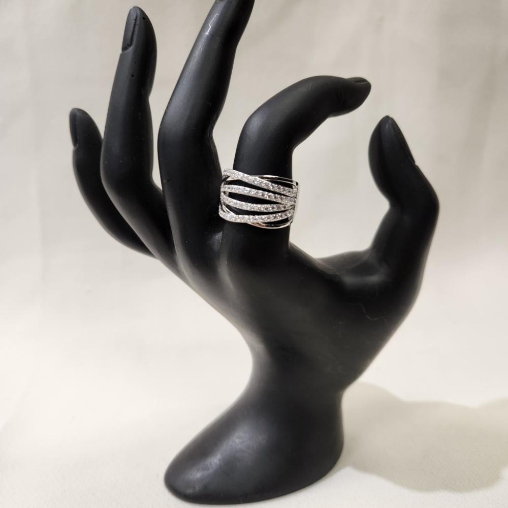 Silver hued wide band stone studded ring