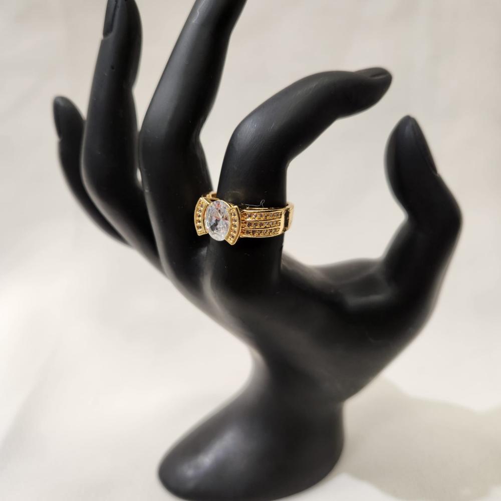 Gold ring with round center stone