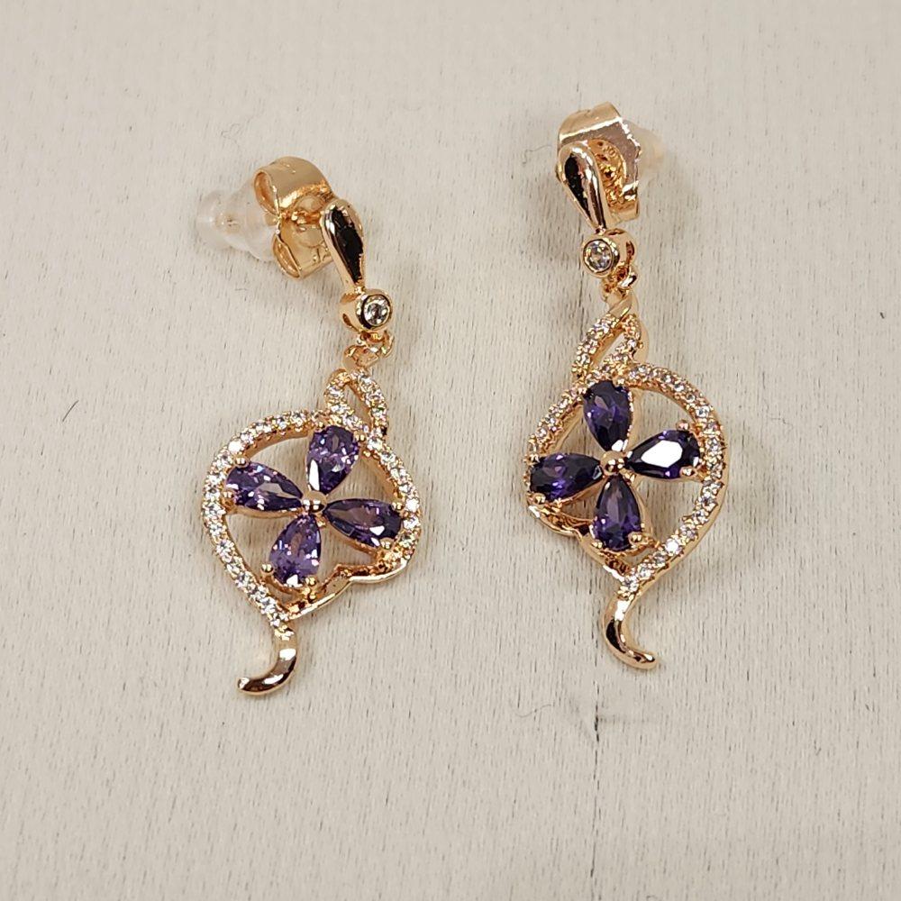 Detailed view of delicate dangle earrings