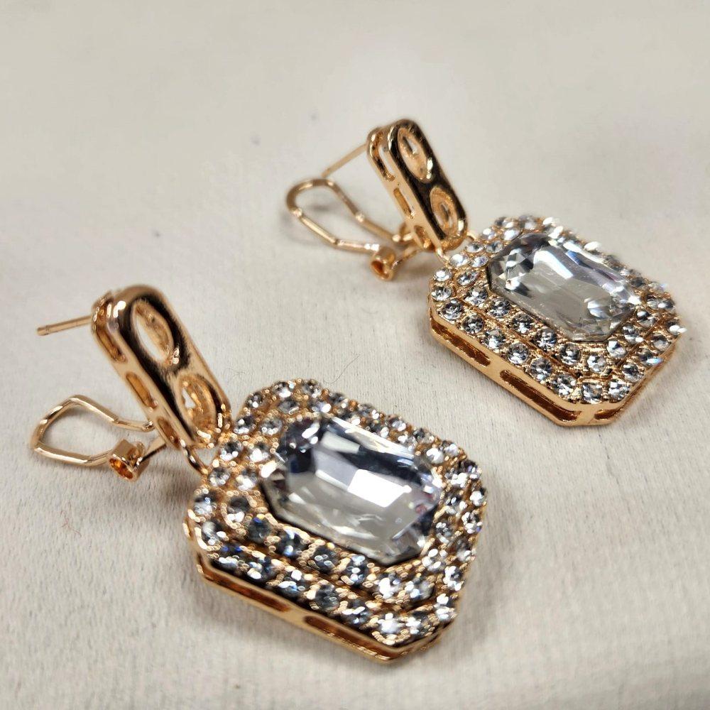 Closer view of earrings with omega back closure