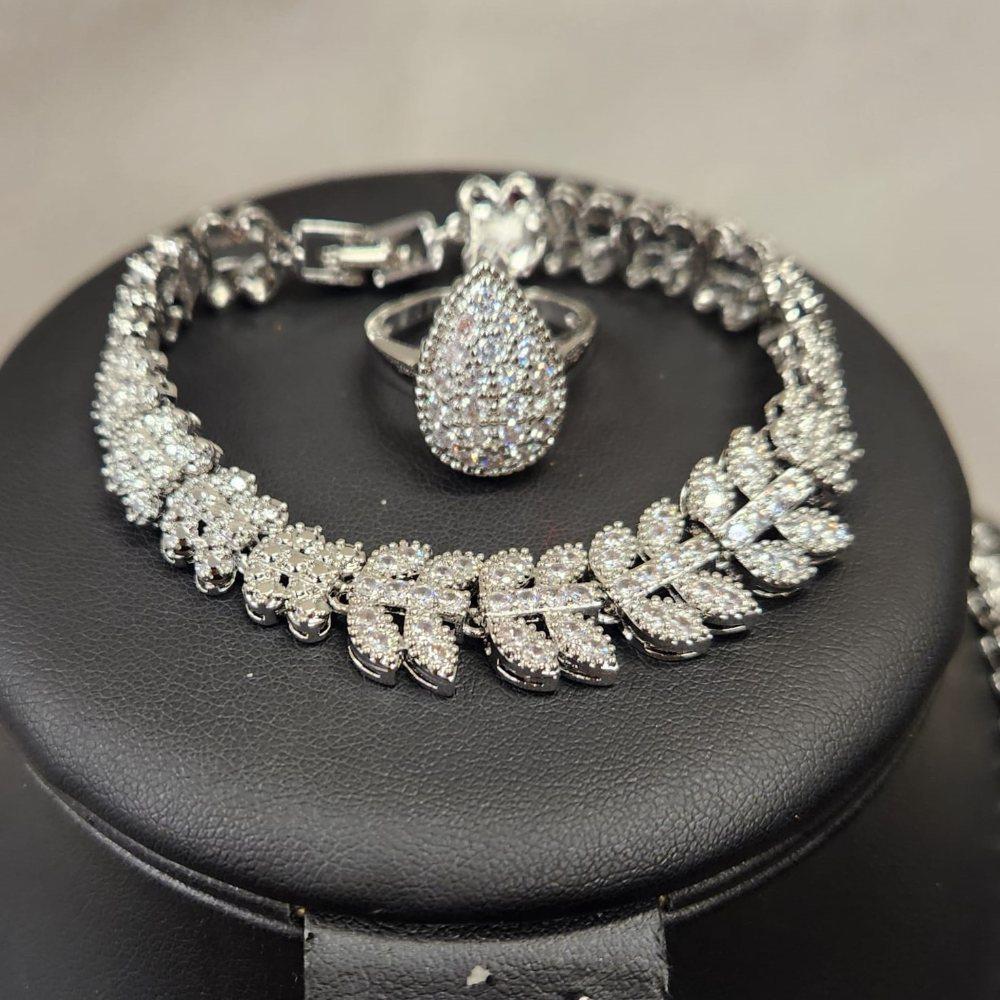 Detailed view of ring and bracelet for the silver hued set