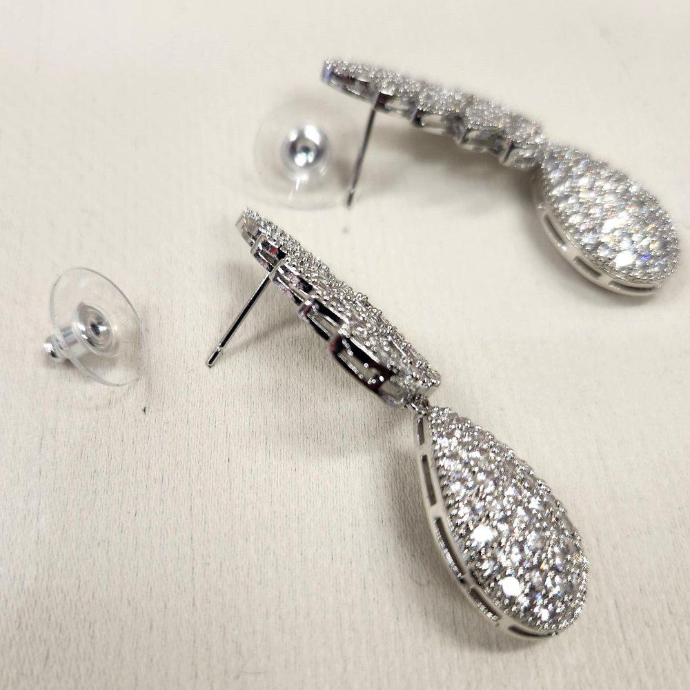 Detailed view of earrings with pushback post