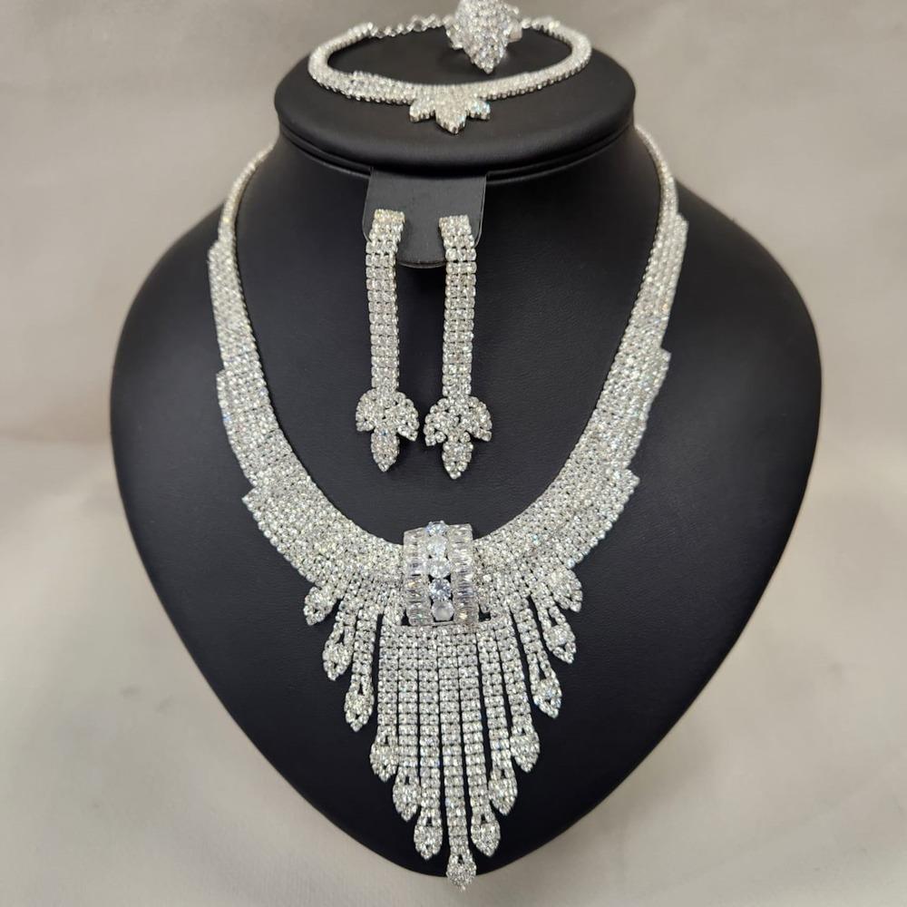 Exquisite five piece jewelry set adorned with sparkling stones