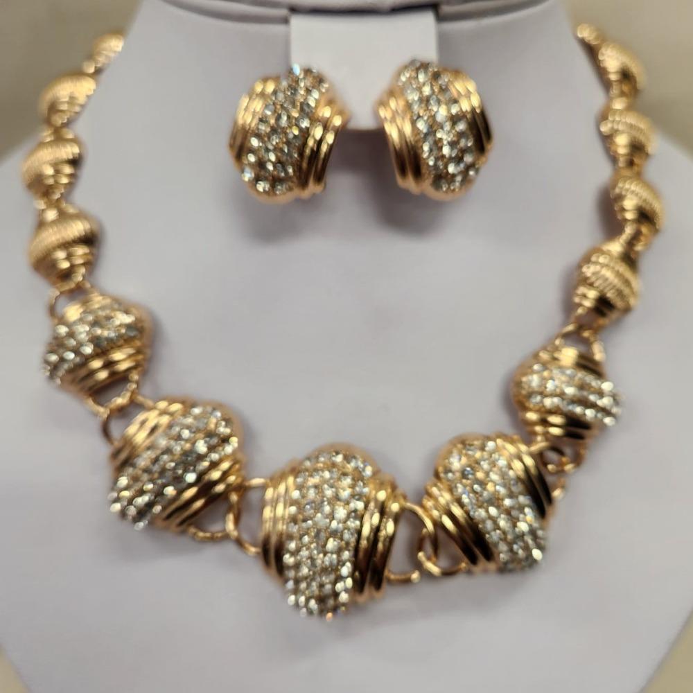 Detailed view of necklace and earrings