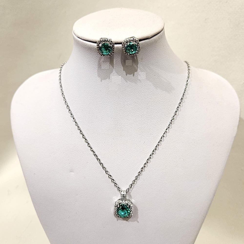 Another view of jewelry set with mint green and clear stones