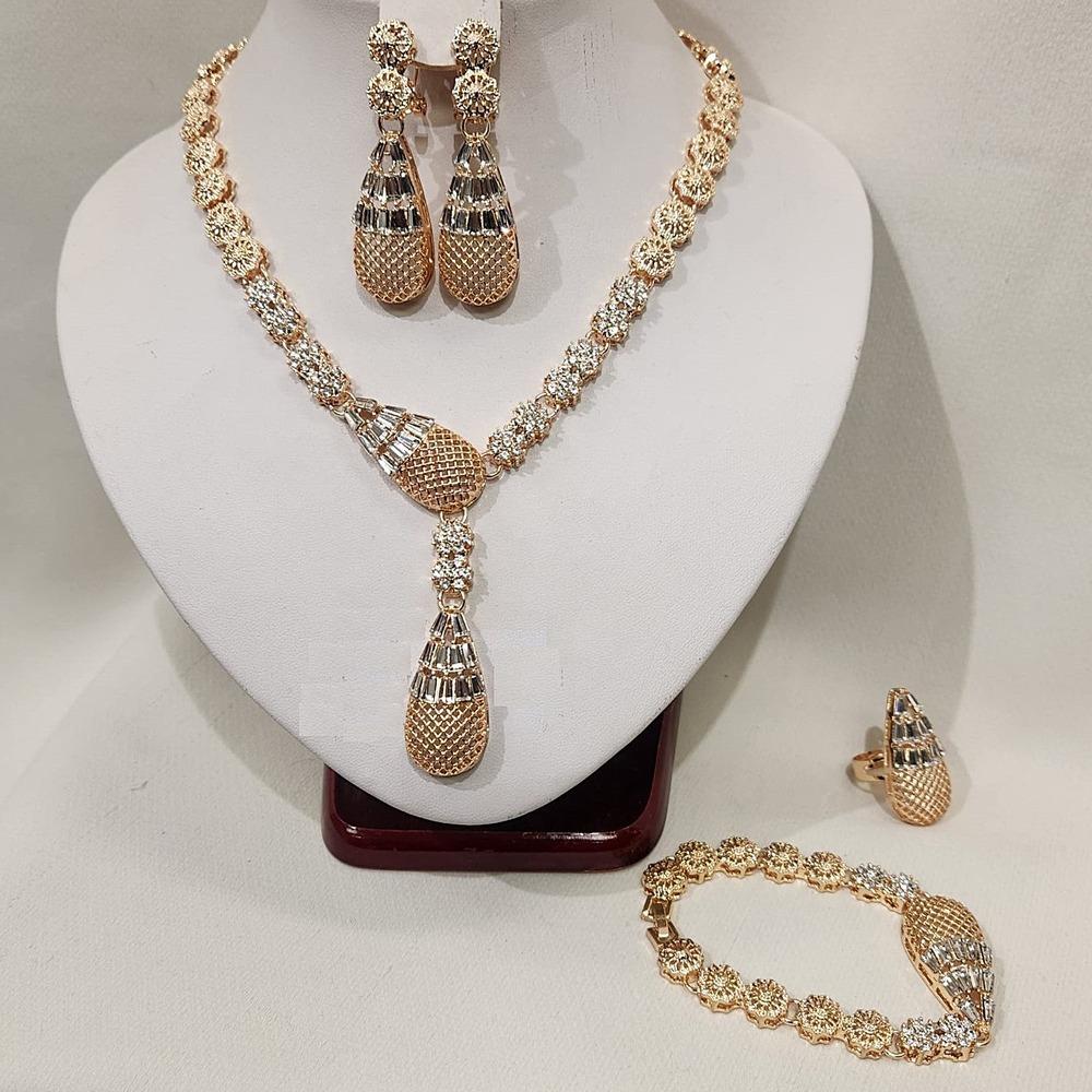 View of Elegant five piece gold frame jewelry set