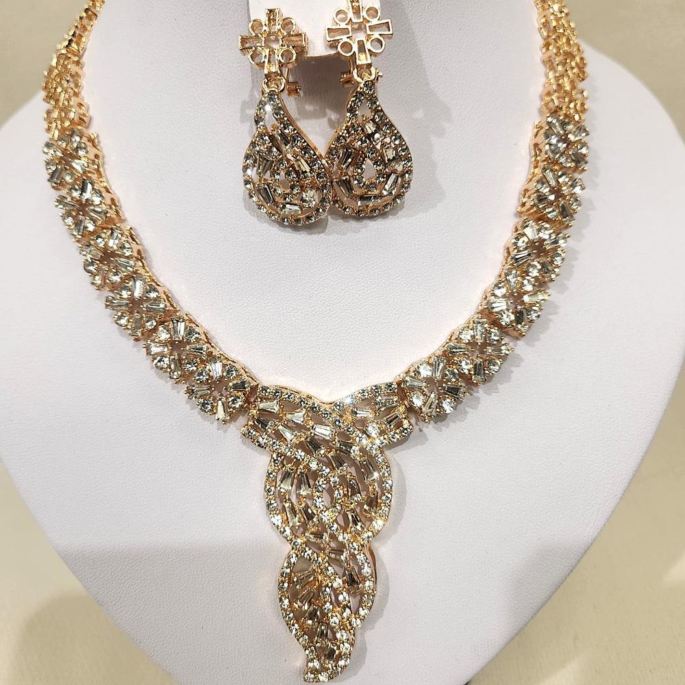Detailed view of necklace and earrings