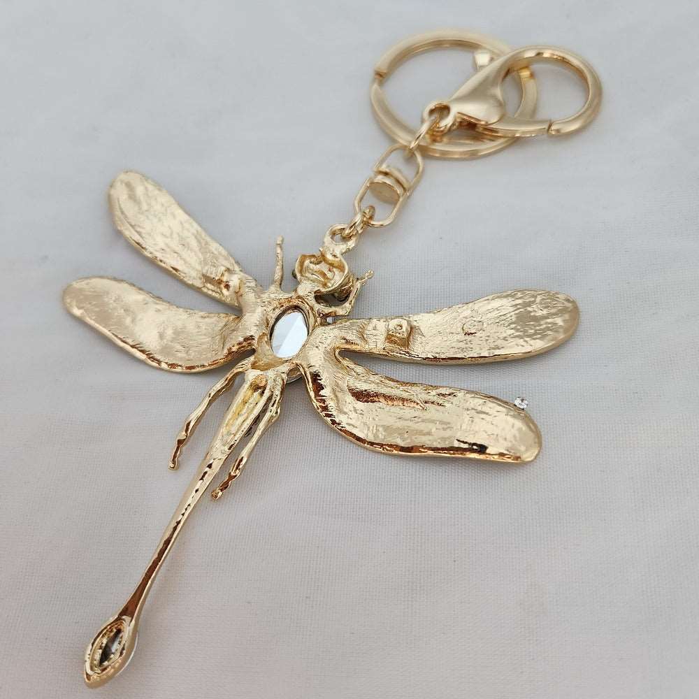 Colorful fire fly shaped purse charm when reversed