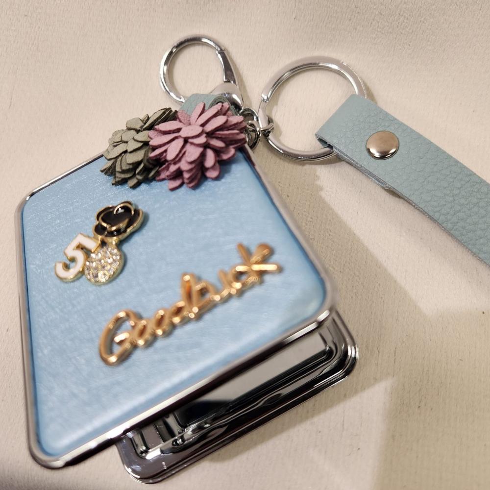 Another view of blue mirror purse charm