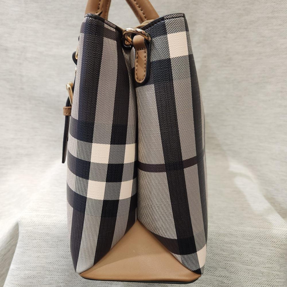Side view of Plaid pattern handbag with mud color handle