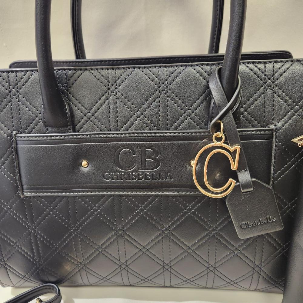 Detailed view of black textured handbag