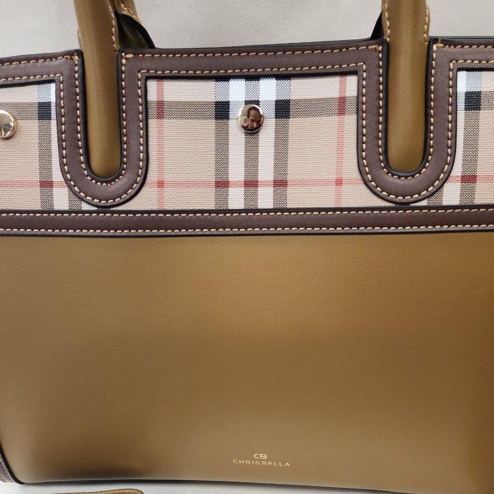 Another view of the front of mud colored handbag