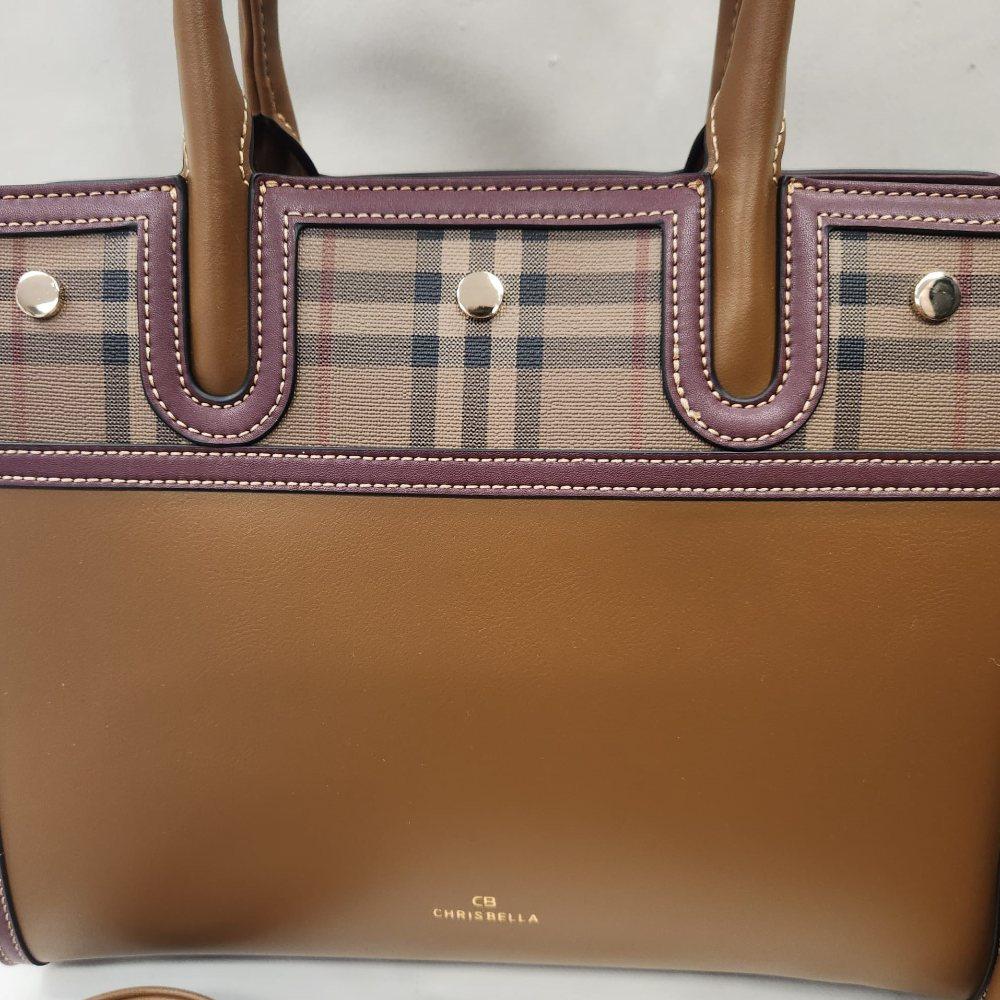 Detailed view of top plaid pattern