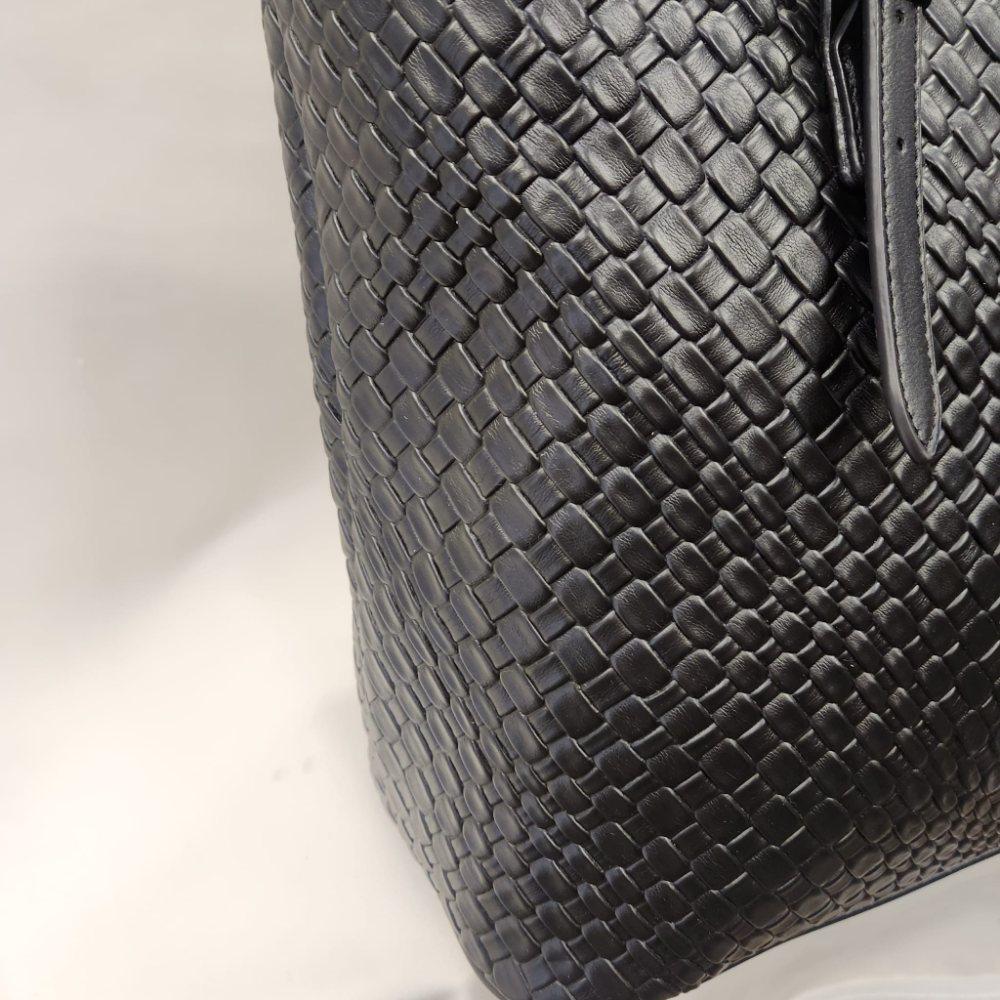 Detailed side view of David Jones textured bag in black color