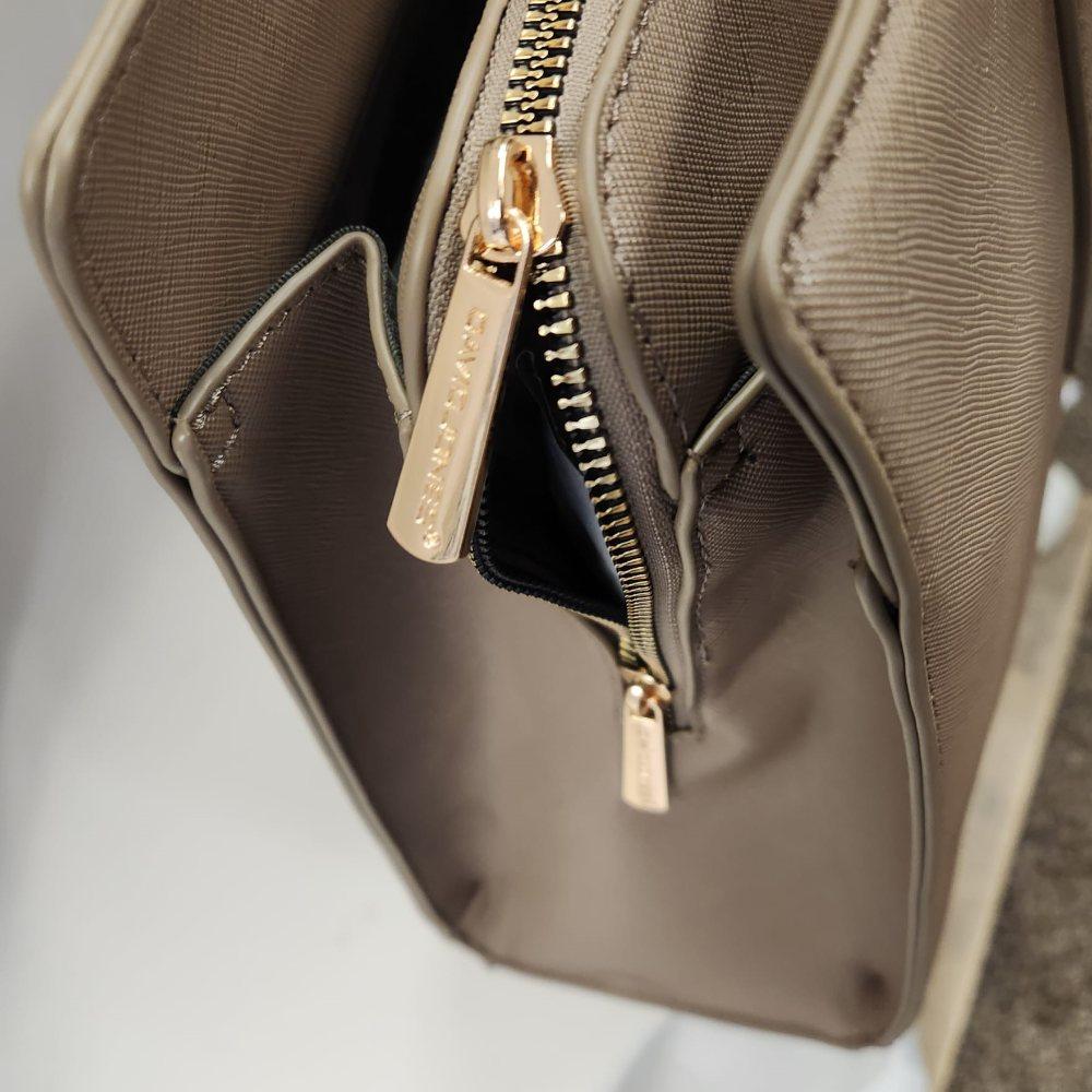 Gold colored hardware of taupe colored David Jones handbag