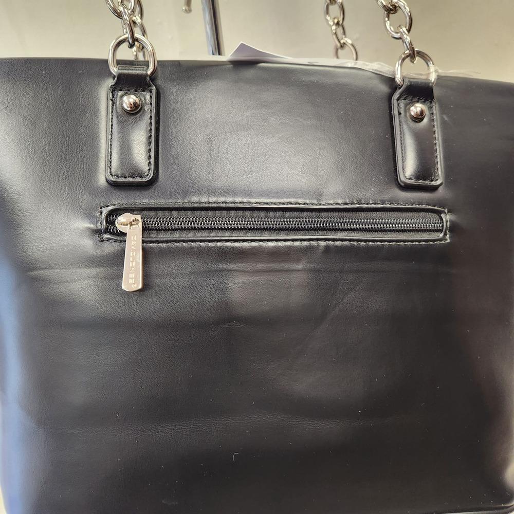 View of rear end pocket with zip closure