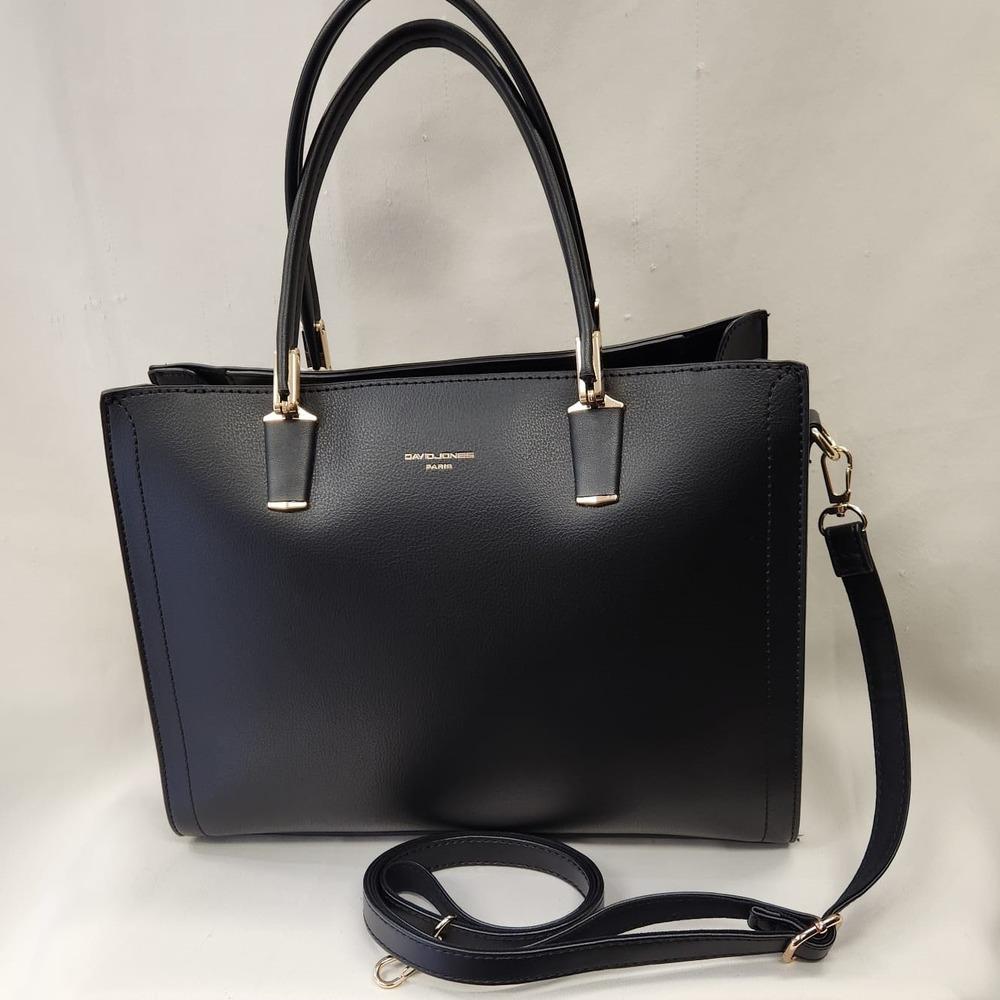 Two top handles and detachable handle of black handbag