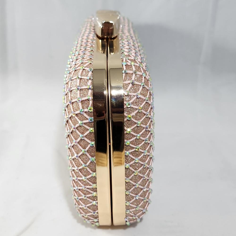 Side view of peach pink party purse with AB stones