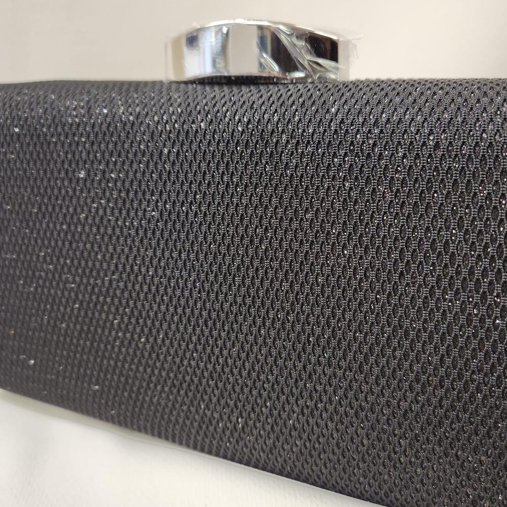 Detailed view of black shimmery party purse