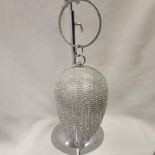 Silver globe shaped party purse with clear stone tassels