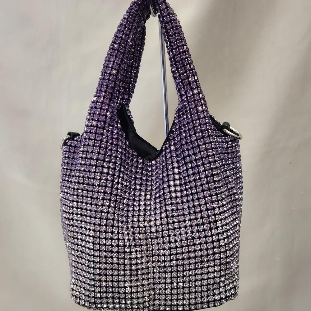 Detailed view of Variegated tone stone studded part purse