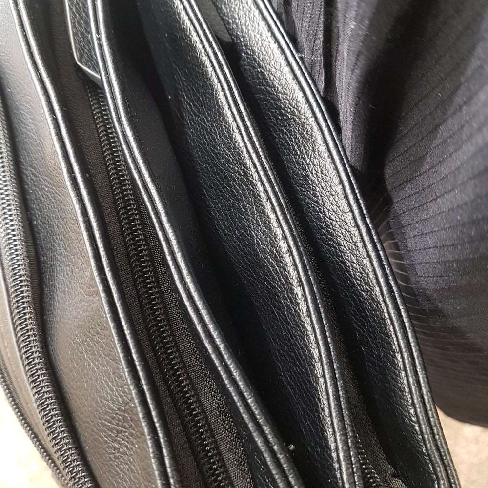 Zipper compartments of artificial leather side bag