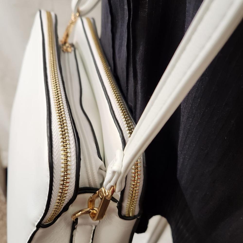 Three compartments of white side bag