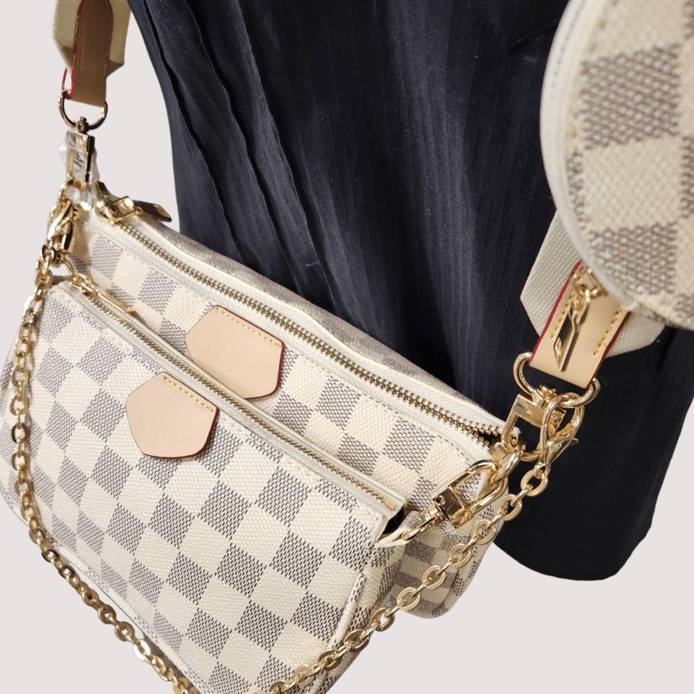 Gold chain strap with three piece side bag
