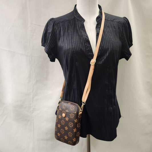 Small brown floral pattern side bag with beige strap