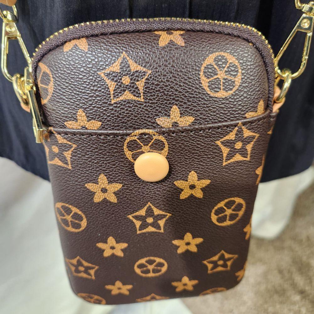 Front detailed view of Small brown floral pattern side bag