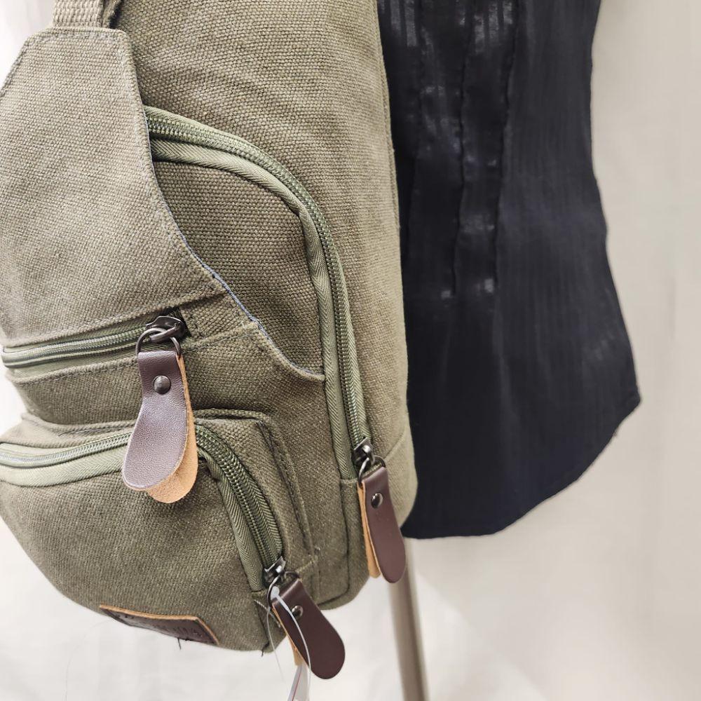 Side view of Army green side bag