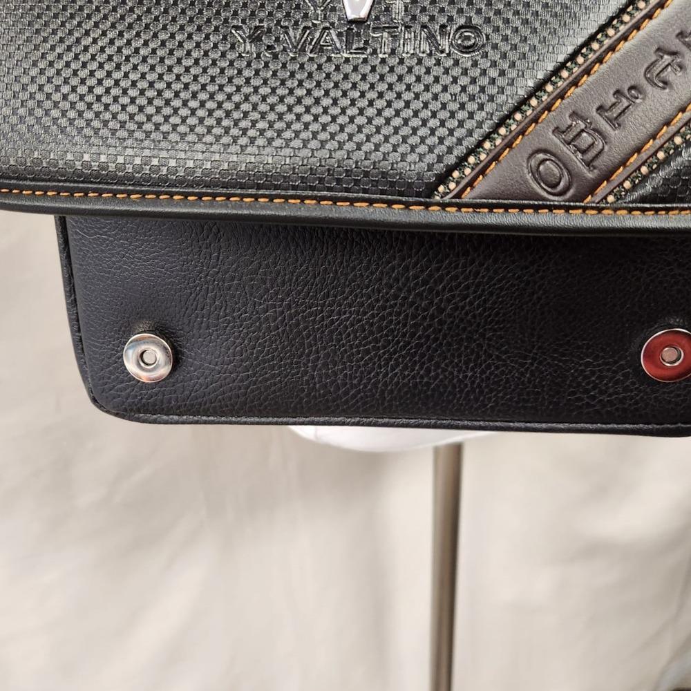 View of the front flap with buttoned closure