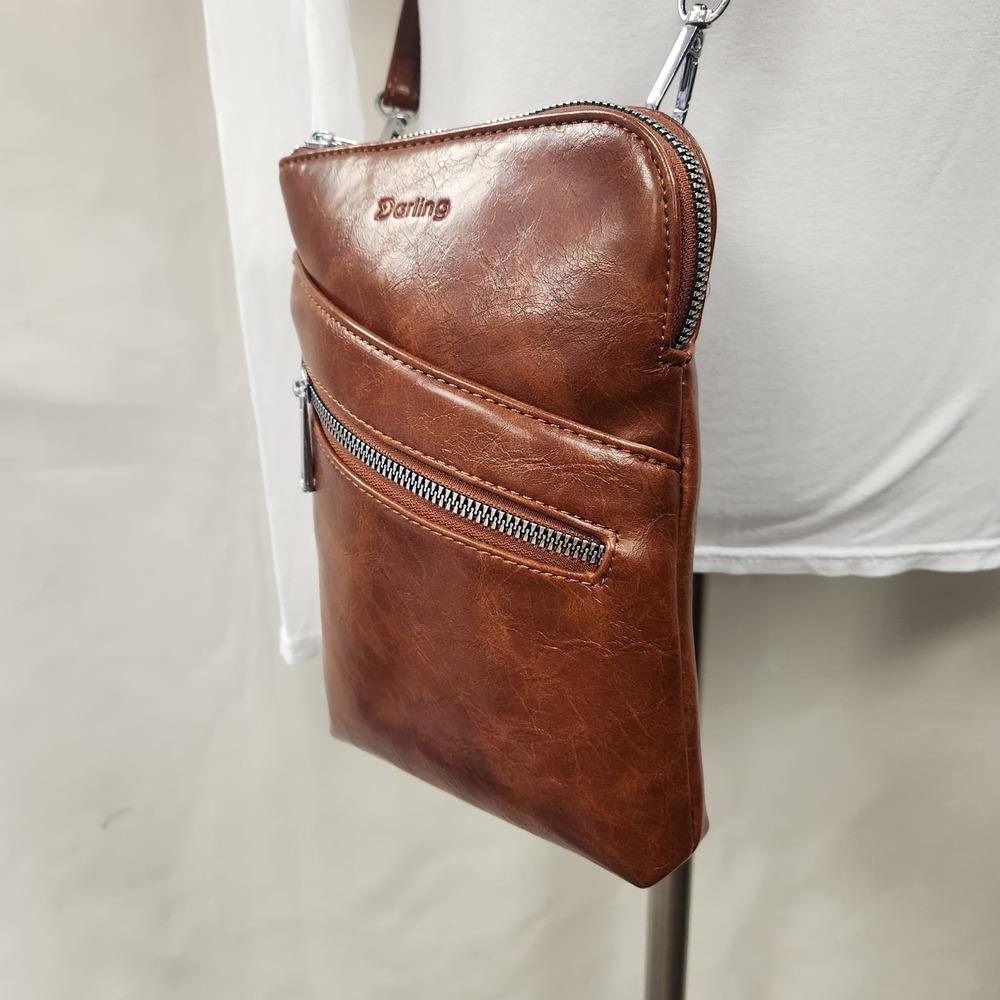 Detailed front view of Small brown colored side bag