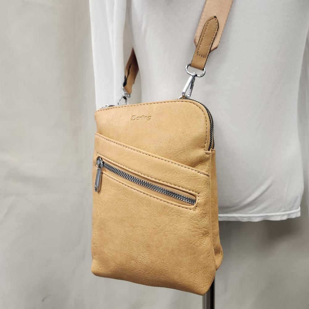 Detailed front view of Tan shade side bag with multiple pockets