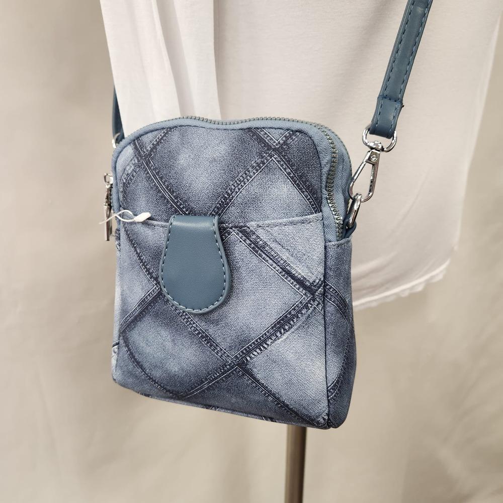 Detailed view of Grey blue jean print side bag with pockets