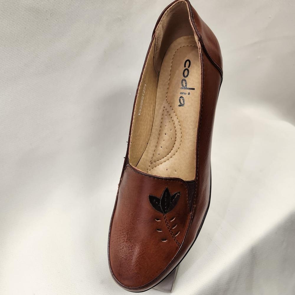 Tan shoes with small platform heel