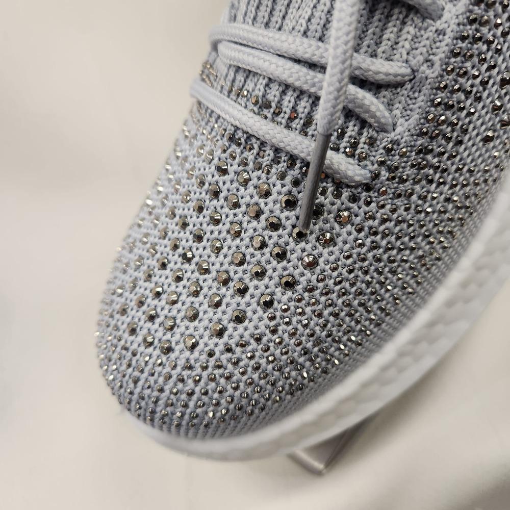 Detailed view of front of Silver light weight runners with stones