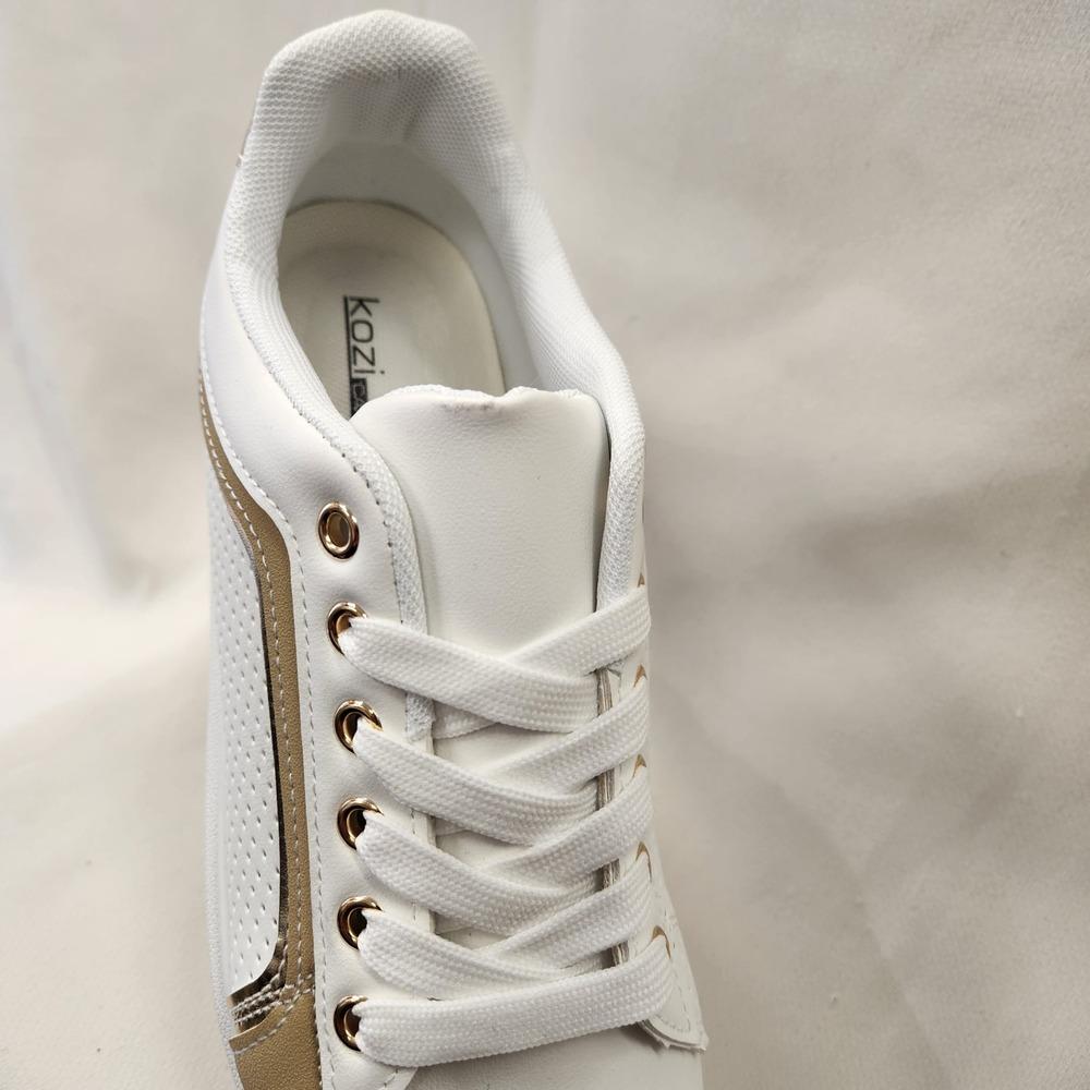 Partial front view of White runners with beige and gold accent color