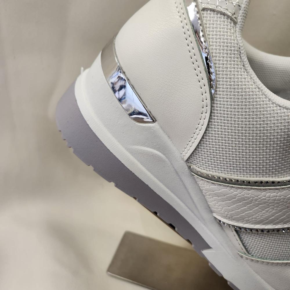 Rear view of White runners with silver trim