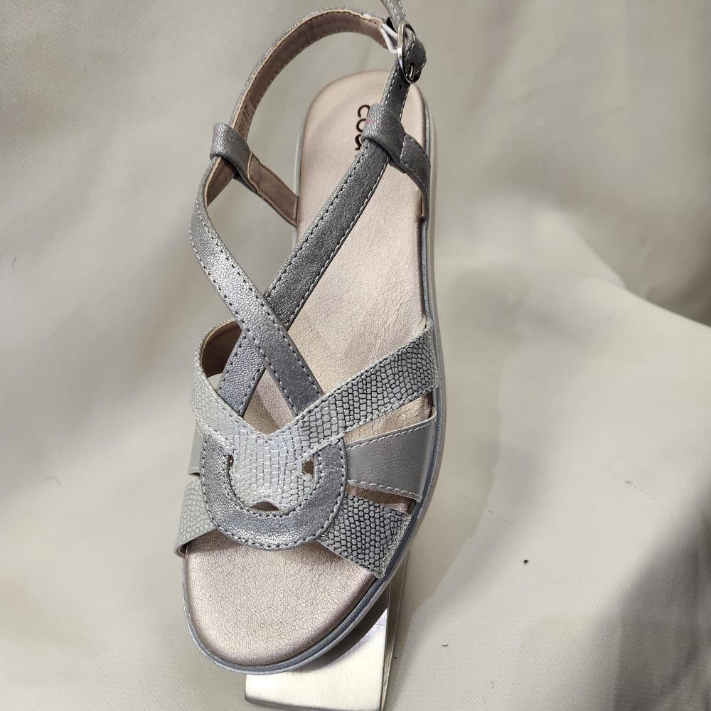 Front view of dull silver summer sandal with buckle fastening