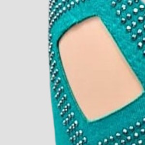 Detailed view of the cut-out design and beading detail.