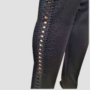 Detailed view of the black leggings