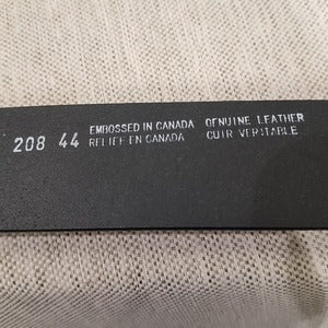 Detailed view of the reverse side of the leather belat