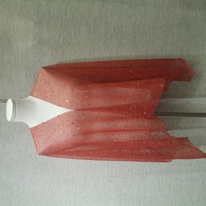 Glittery red crinkled scarf when opened