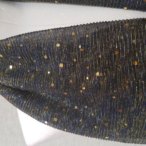 Detailed view of blackish blue crinkled scarf