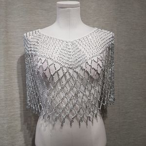 Dressy white capelet with shimmery beads