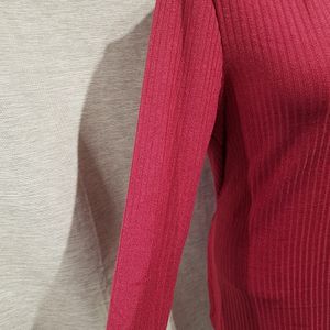 Side view of magenta color top